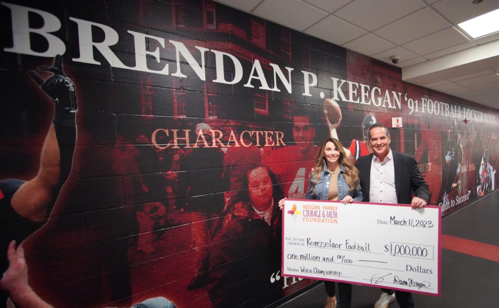 Mr. and Mrs Brendan Keegan with check