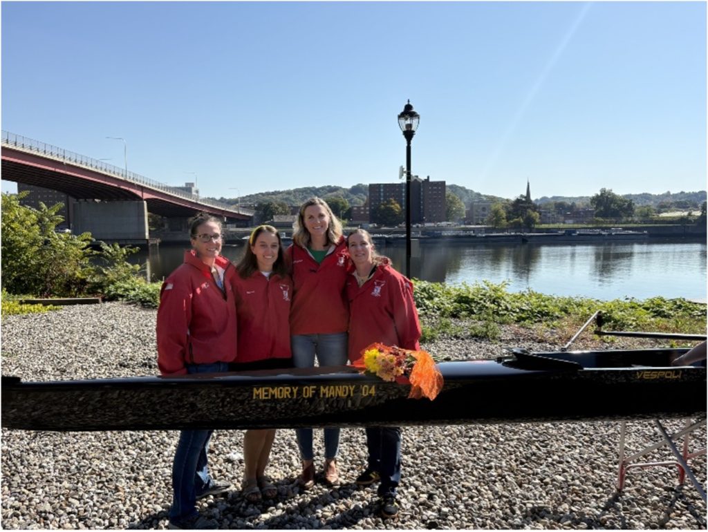 Honoring Mandy Gone too soon, Mandy, a graduate of the School of Science with a degree in Chemistry, lived a beautiful life even while facing a deadly disease. She was “pint-sized” in stature but immense in heart, pushing teammates not only on the water but in life. Her philosophy was simple: “The size of the rower does not determine the heart of the rower.” Academically curious, unyieldingly motivated, quick to laugh, and forthright in her views, Mandy welcomed everyone to the team and inspired those around her to be their best selves. Beyond rowing, she was a fierce friend, a loving partner to her husband Mervyn, and an amazing mother to her sons Cedric and Damian. Her warmth, leadership, and dedication continue to resonate with the RPI community.